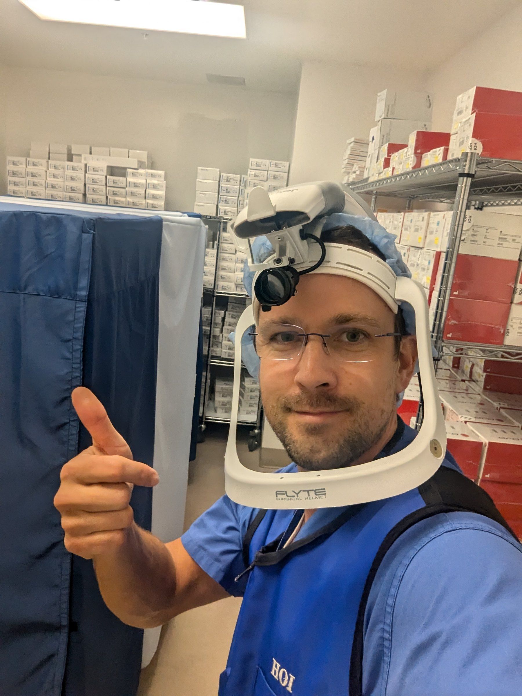 Matthew Siljander in a surgical helmet before a case
